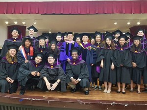 IMPIS students with Director, Dr. Teng taking a photo together after the turning of tassel ceremony at the Yun-Shui Hall, 2F of Fong-Yu Building (Credit: Emelyn Peralta)