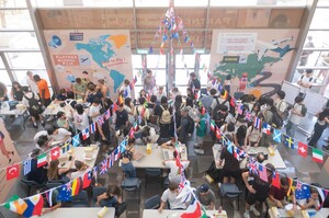 A buzzing aerial view of the Partner School Fair, where global flags and student energy filled the space with excitement and exchange.(Photo by NCCUC)(Open new window/jpg file)Image