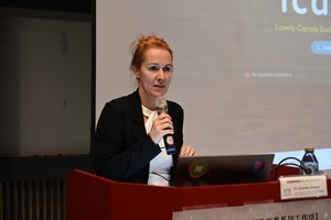 Speaker Dr. Krisztina Domjan introduced various pedagogically effective AI tools, and how to let students become autonomous and responsible learners when making use of AI. (Photo by EMI Resource Center)(Open new window/jpg file)Image