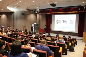 International Students listening to the company introduction and recruitment from a representative of Taishin Holodings Co. (Photo:OIC)