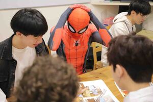 Students focused intently during the immersive game, working together to solve the clues. (Photo credit: ICI)(Open new window/jpg file)Image